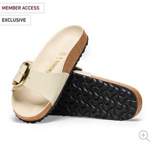 Birkenstock Cream Sandals with Black Sole